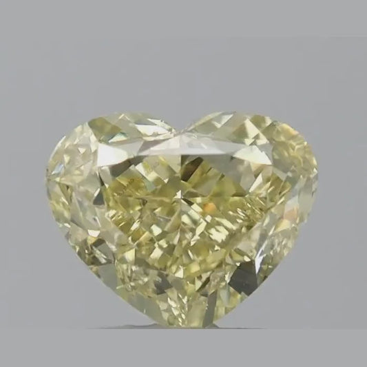 1.01ct GIA Certfied Fancy Yellow Heart Shape Diamond SI1 Clarity - Sold