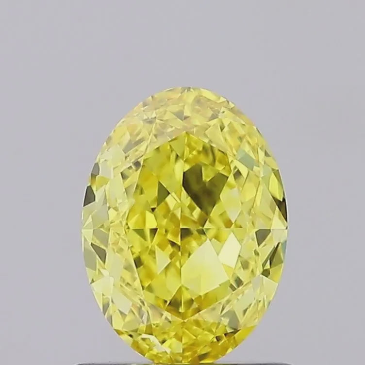 Video showcasing 1.01 carat Fancy Intense Yellow Lab Grown Oval Diamond, IGI Certified VVS1, available exclusively at Diamond Reserve by Joshua.